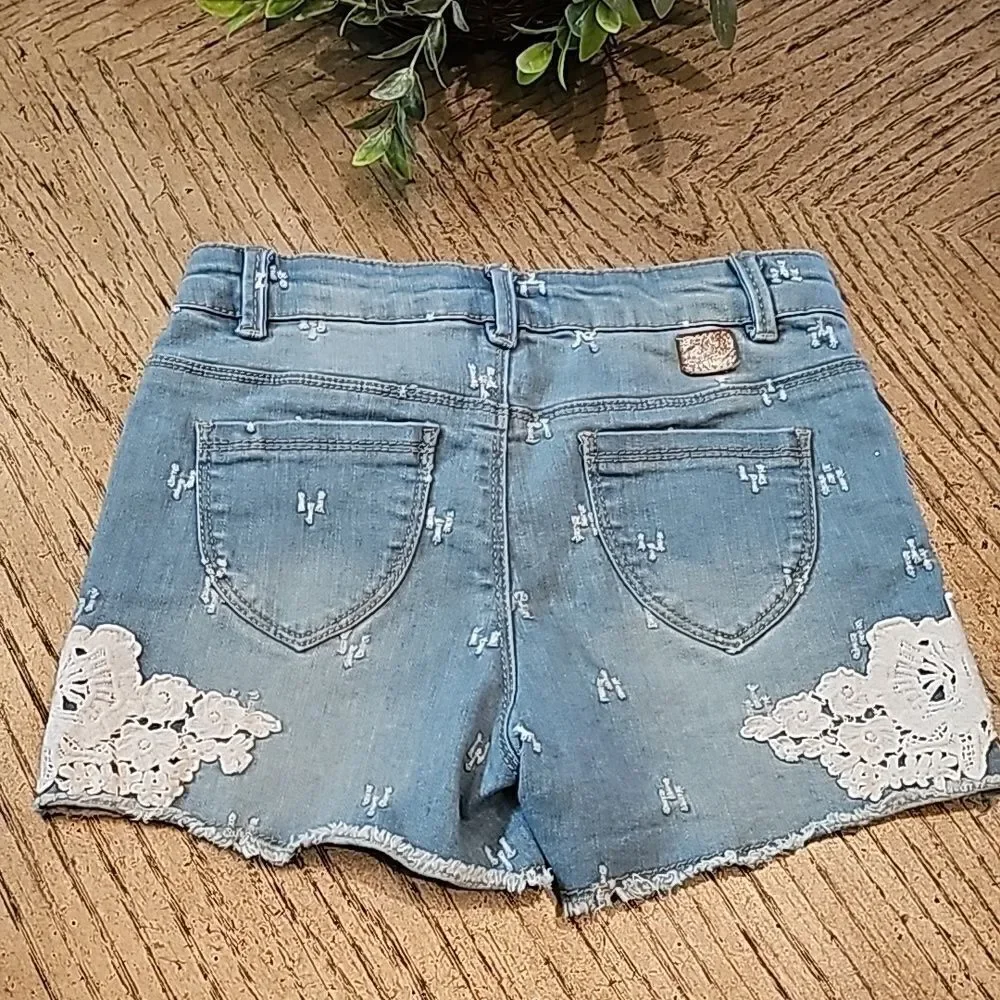 Girls blue Jean shorts with lace flower details size 8